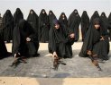 rs-are-seen-with-their-weapons-during-a-ceremony-for-92-women-who-completed-a-two-month-course-in-the-shiite-holy-city-of-karbala-50-miles-south-of-baghdad-iraq